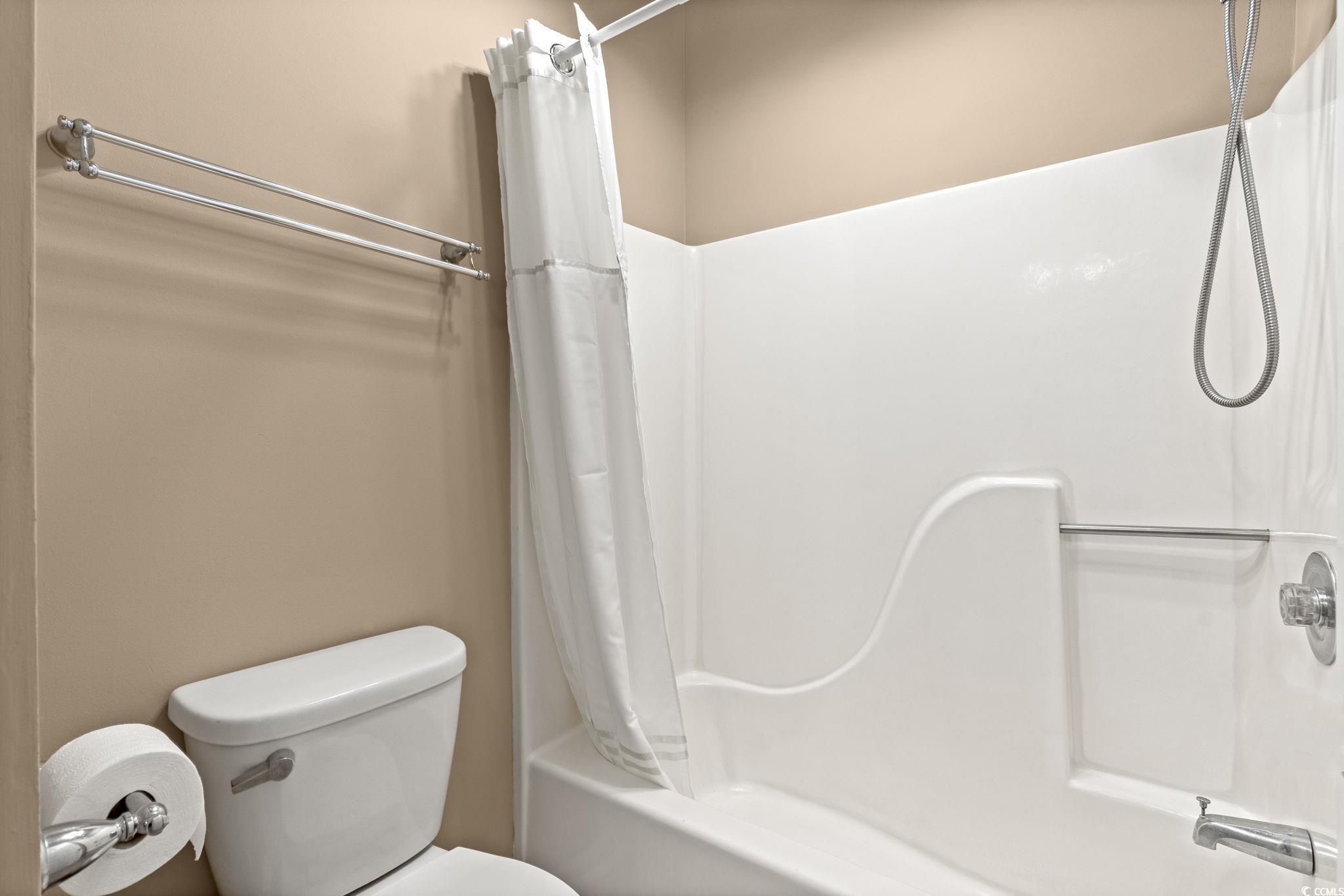 613 14th Avenue South, Unit 34 Surfside Beach, SC 29575 - Photo 16 of 37 Bathroom featuring shower / bath combo and toilet