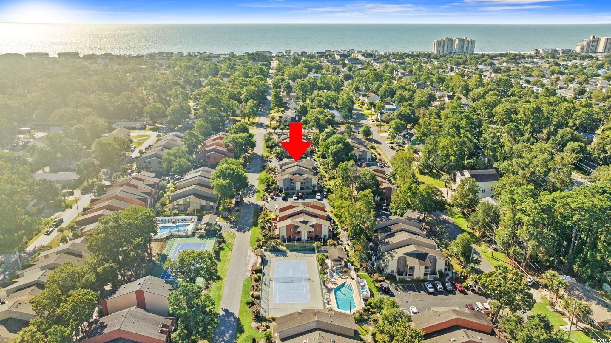 613 14th Avenue South, Unit 34 Surfside Beach, SC 29575 - Photo 30 of 37 Aerial view of property's location with nearby suburban area and a nearby body of water