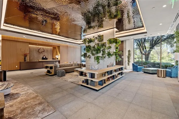 a outdoor living area with furniture and a potted plant