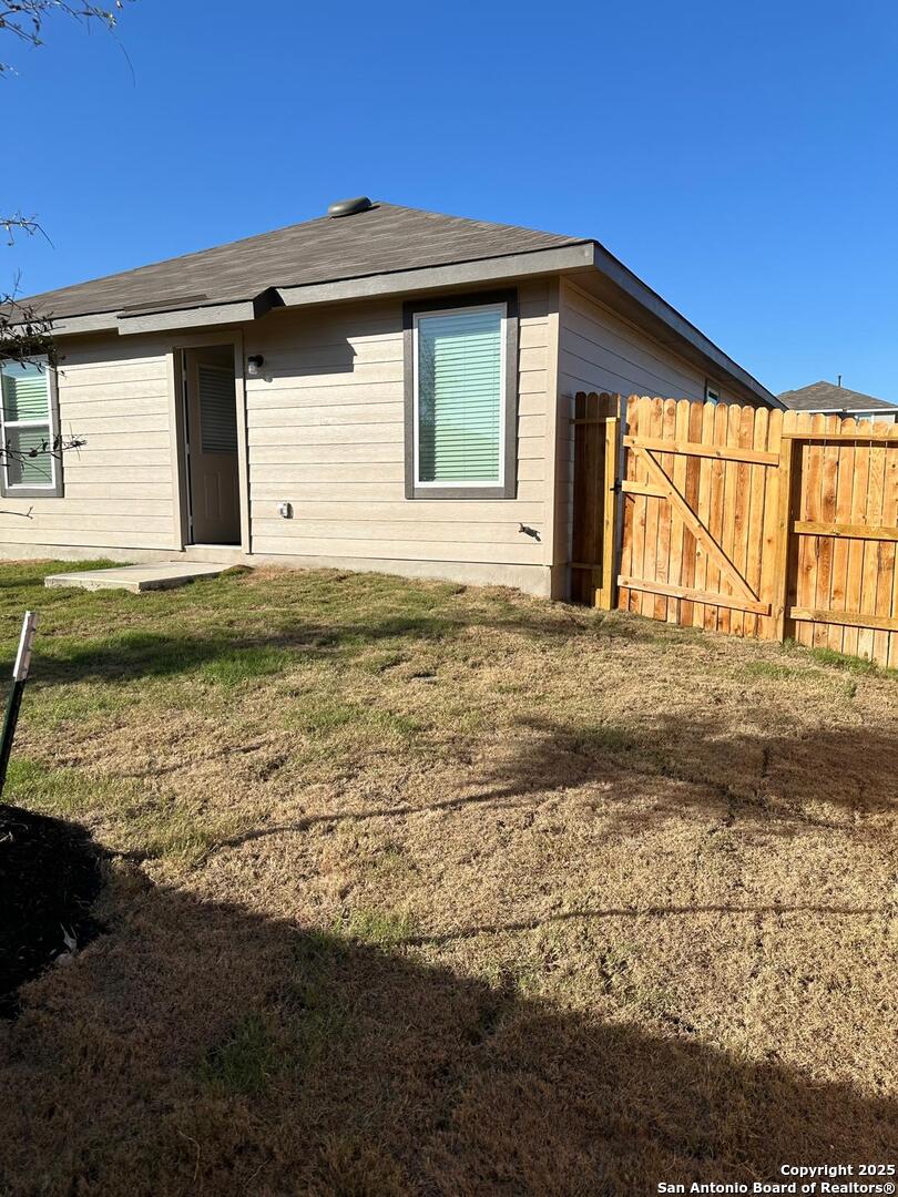 5032 Pitch Mark San Antonio, TX 78261 - Photo 19 of 21 a house that has yard in front of it