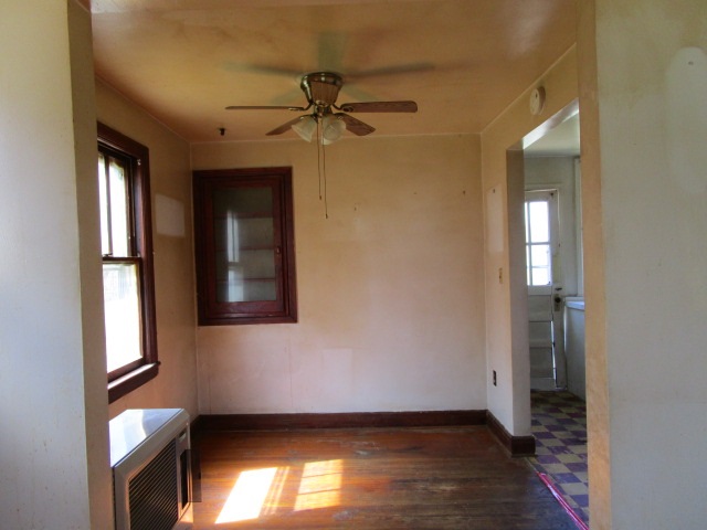 676 St James Road Fishersville, VA 22939 - Photo 3 of 13 a view of an empty room with window and wooden floor