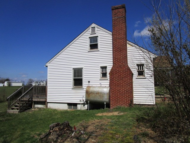 676 St James Road Fishersville, VA 22939 - Photo 9 of 13 a front view of a house with a garden