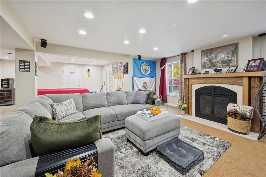 1005 Autumn Woods Drive Coraopolis, PA 15108 - Photo 43 of 50 a living room with furniture and a fireplace