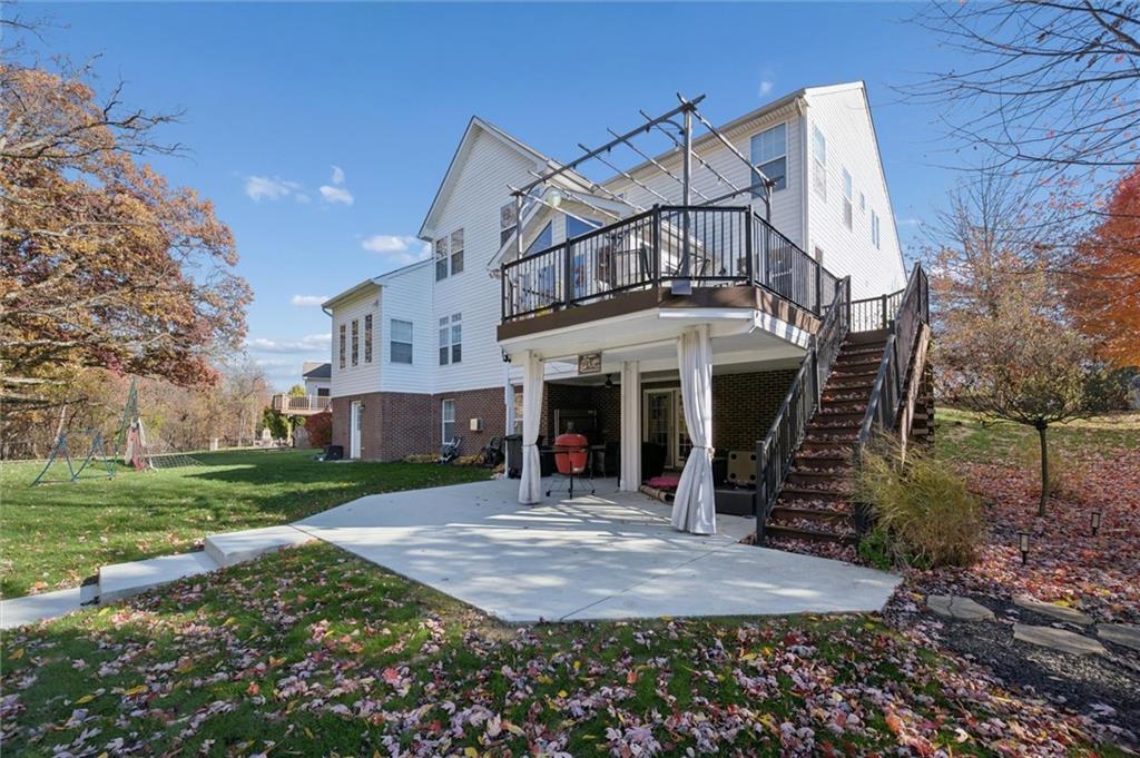 1005 Autumn Woods Drive Coraopolis, PA 15108 - Photo 47 of 50 front view of a house with a yard
