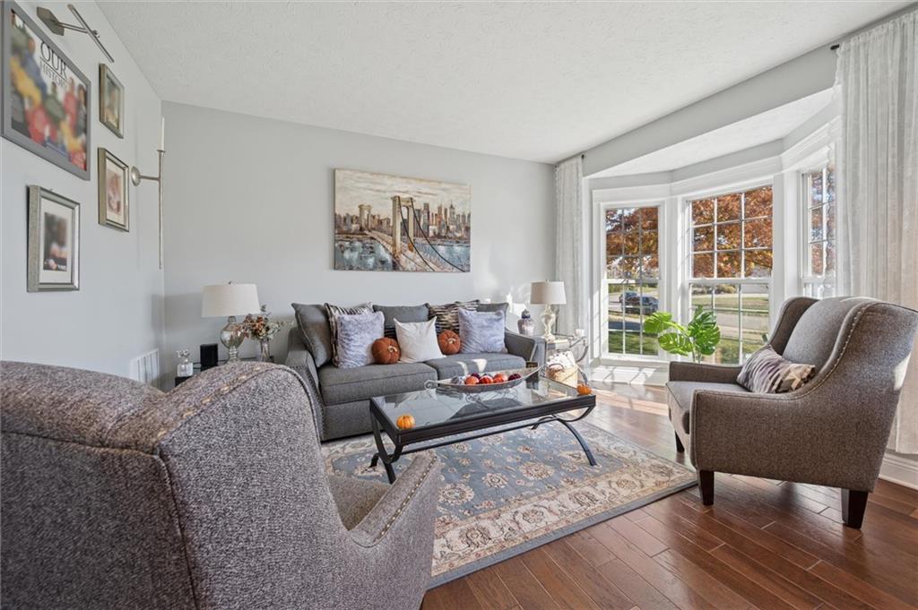 1005 Autumn Woods Drive Coraopolis, PA 15108 - Photo 5 of 50 a living room with furniture and a large window