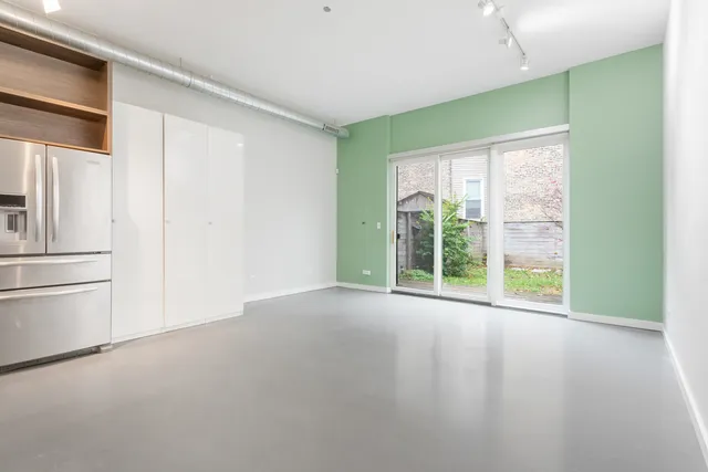 a view of a room with a large window