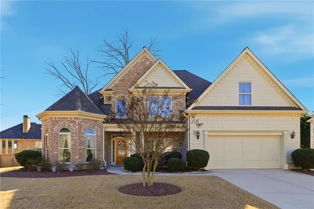 a front view of a house with a porch