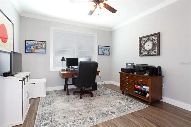 a room with a desk and a workspace