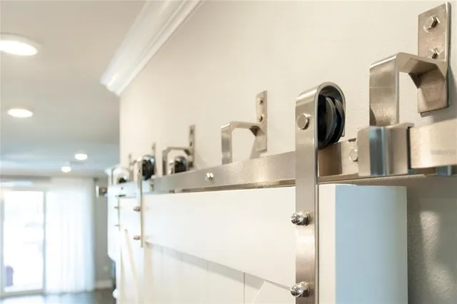 a kitchen with kitchen island a sink and refrigerator