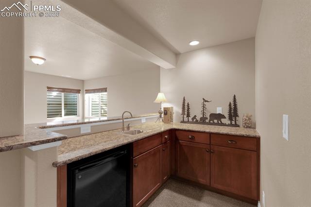 7636 Wichita Ridge Point Colorado Springs, CO 80923 - Photo 23 of 33 Wet bar