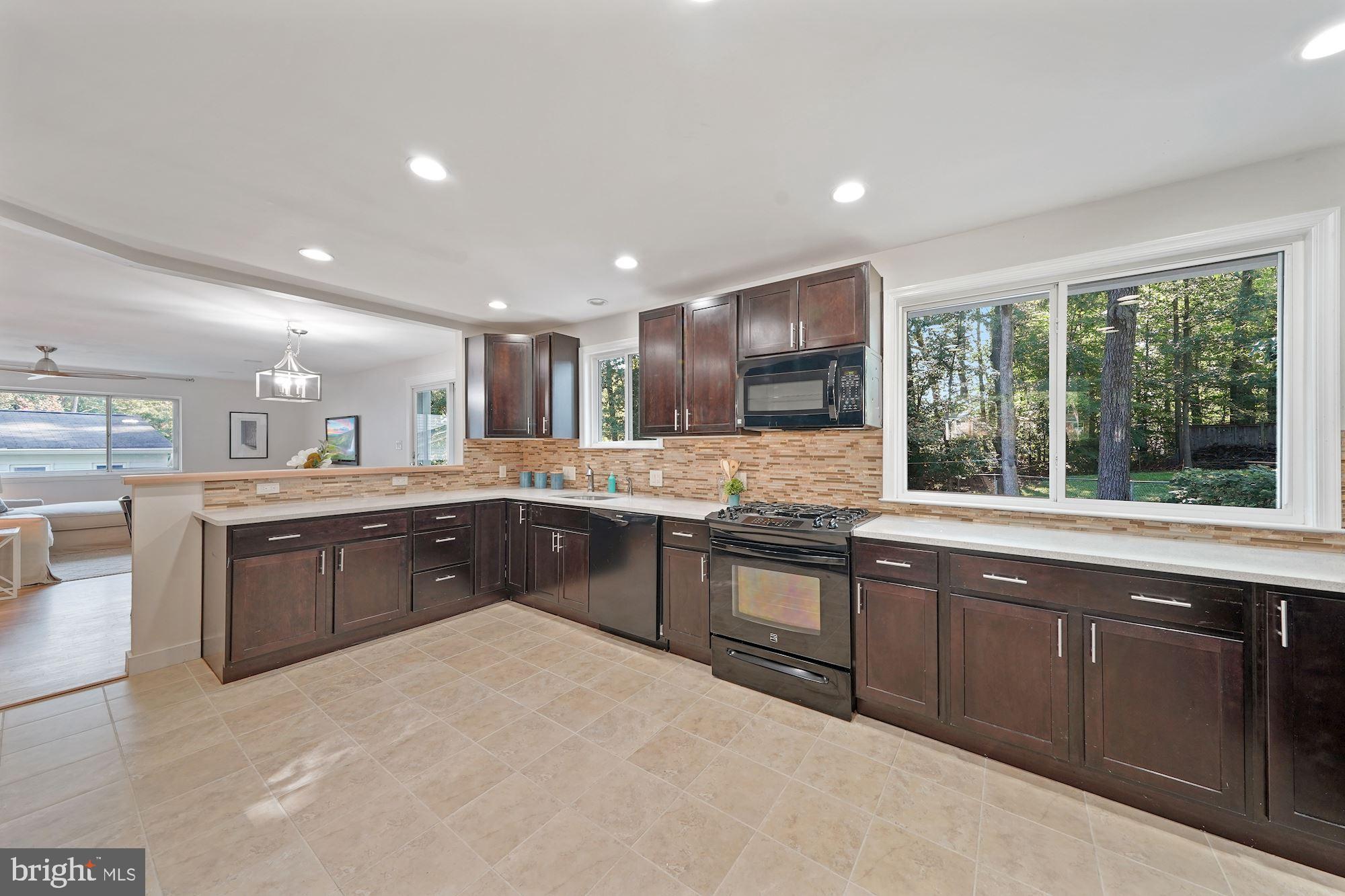 6924 Vancouver Road Springfield, VA 22152 - Photo 9 of 28 New Windows and Recessed Lighting in Kitchen