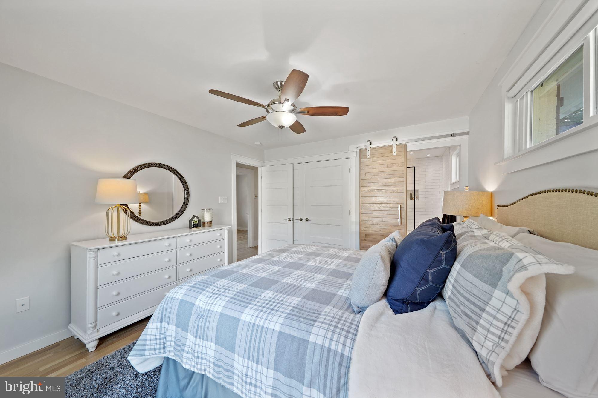 6924 Vancouver Road Springfield, VA 22152 - Photo 12 of 28 Beautiful Sliding Barn Door in Master Bedroom