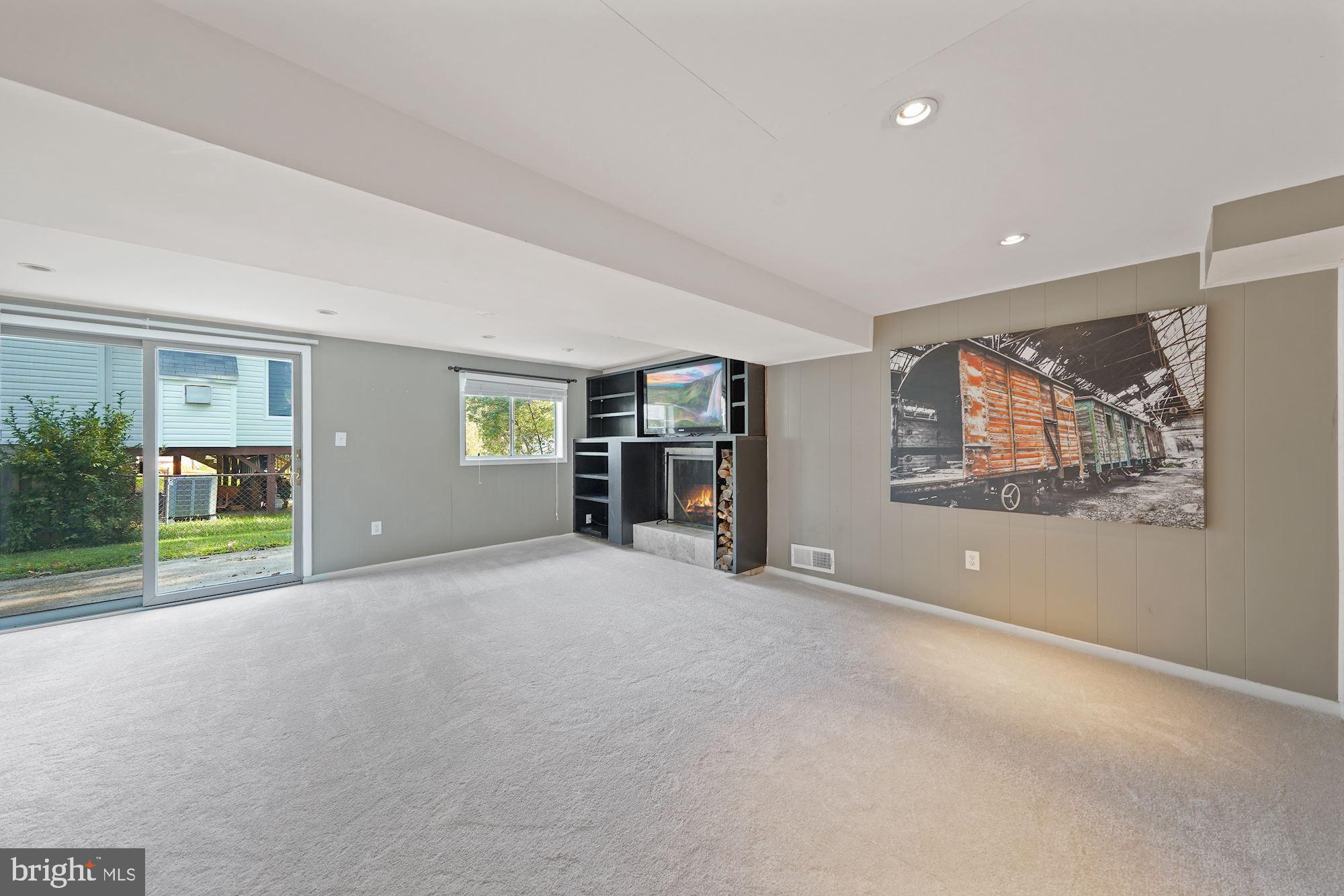 6924 Vancouver Road Springfield, VA 22152 - Photo 20 of 28 Recreation Room with Wood-Burning Fireplace