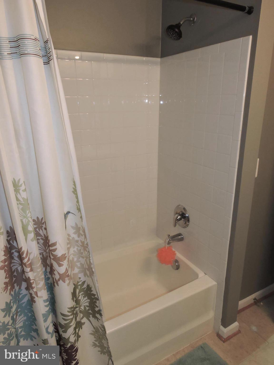 1227 Steed Street Ranson, WV 25438 - Photo 19 of 37 a bathroom with a bathtub