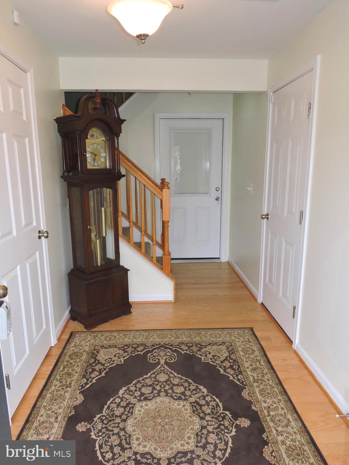 1227 Steed Street Ranson, WV 25438 - Photo 3 of 37 a view of entryway with wooden floor and a rug