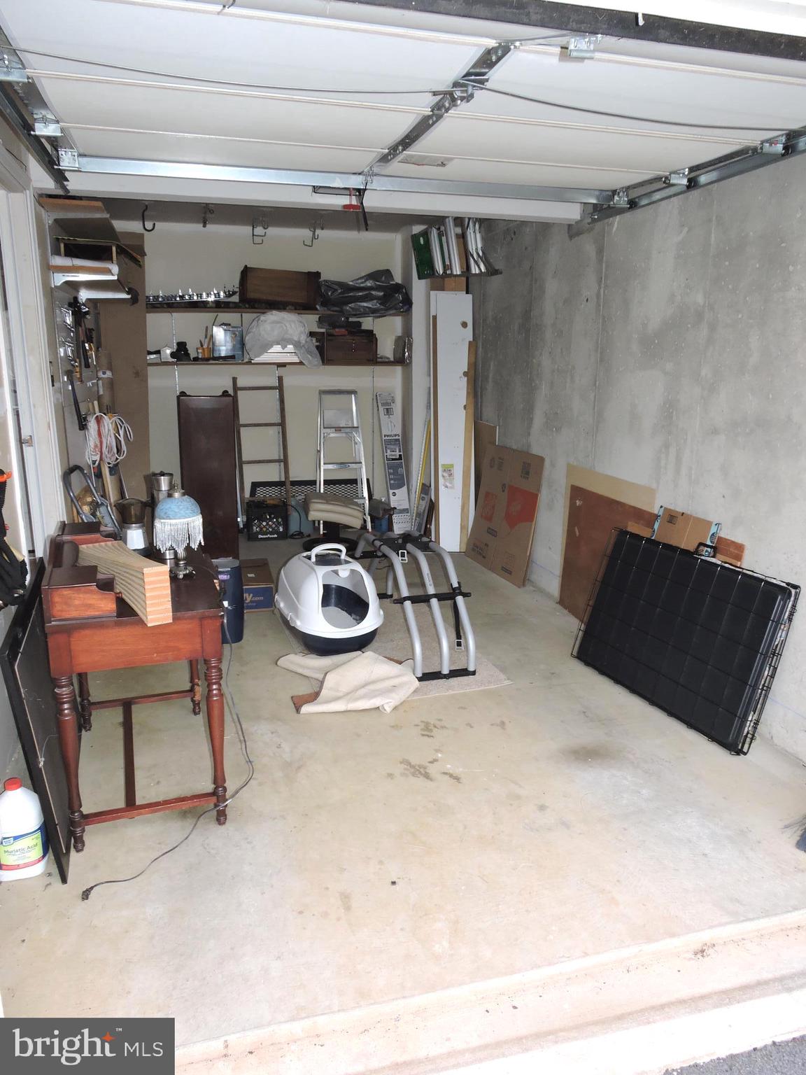 1227 Steed Street Ranson, WV 25438 - Photo 31 of 37 a room with furniture a rug and gym equipment