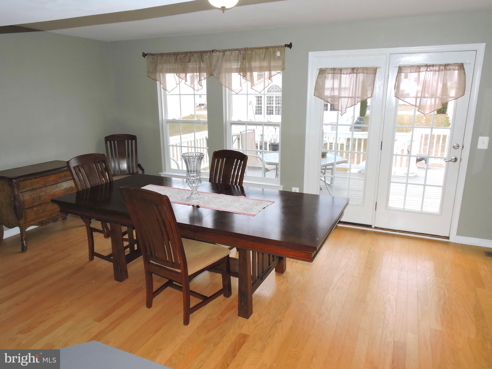 1227 Steed Street Ranson, WV 25438 - Photo 8 of 37 a view of a workspace with furniture and a window