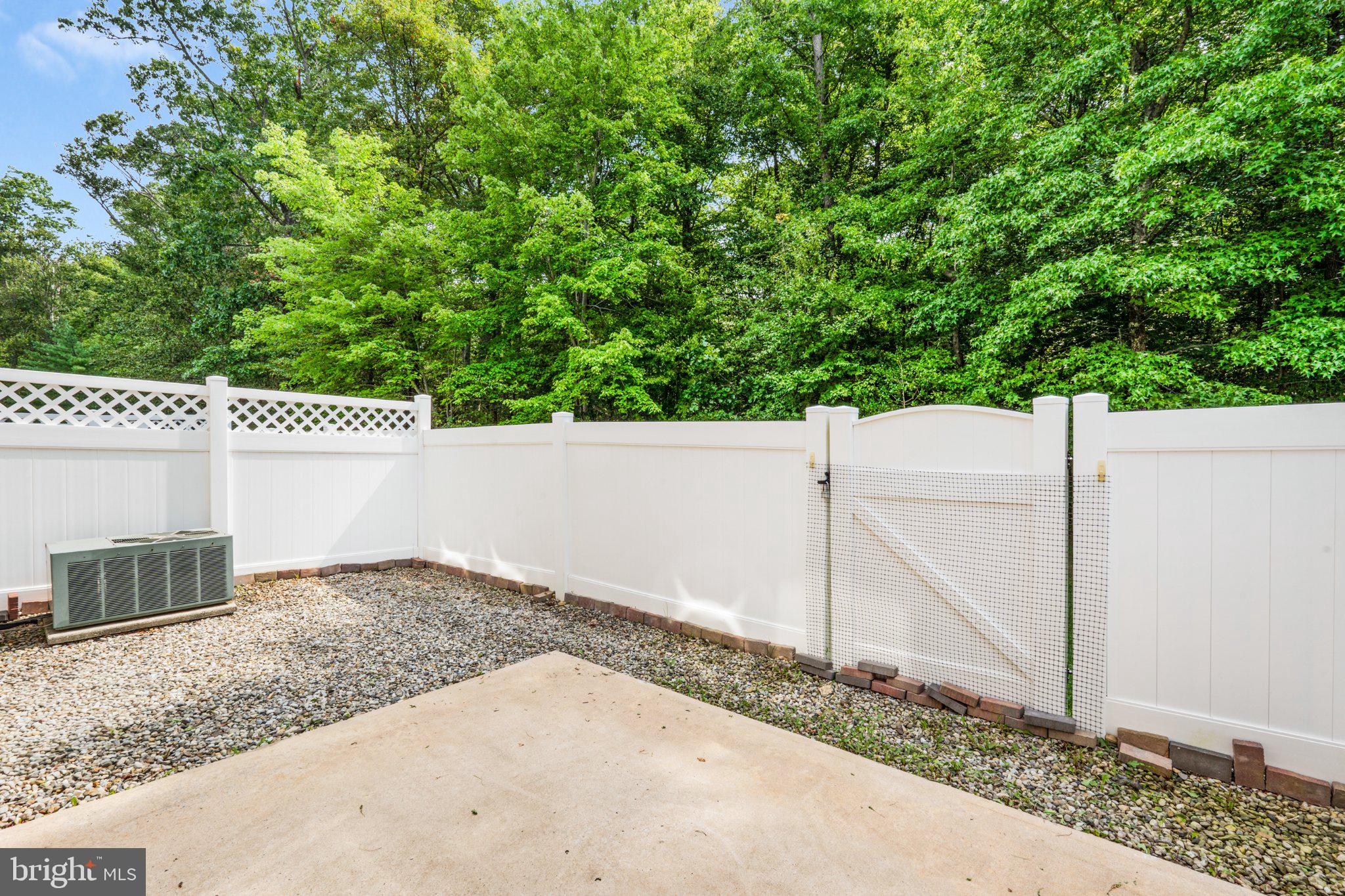 99 Warwick Road Princeton Junction, NJ 08550 - Photo 14 of 35 Serene backyard oasis with lush greenery.