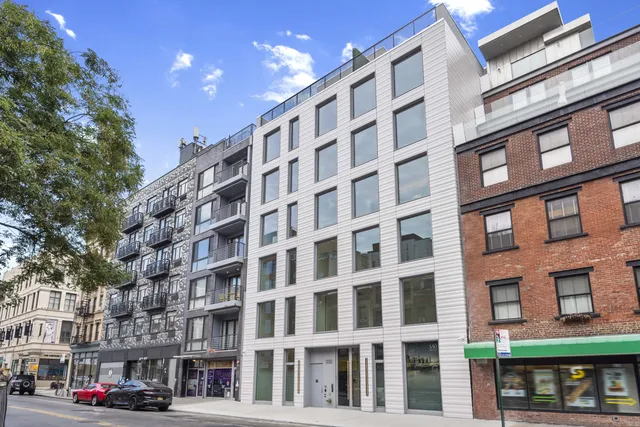 a large building with a street