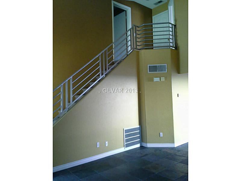 205 Boothbay Street Henderson, NV 89074 - Photo 9 of 14 Property Photo. Stairway above living room
