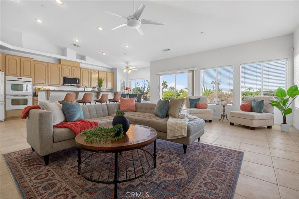 6201 Omega Street Riverside, CA 92506 - Photo 19 of 70 a living room with furniture potted plant and a window