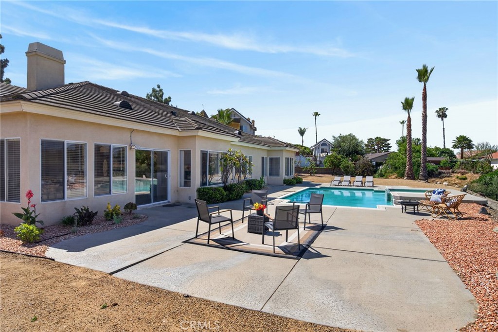 6201 Omega Street Riverside, CA 92506 - Photo 42 of 70 a house view with a sitting space and garden space