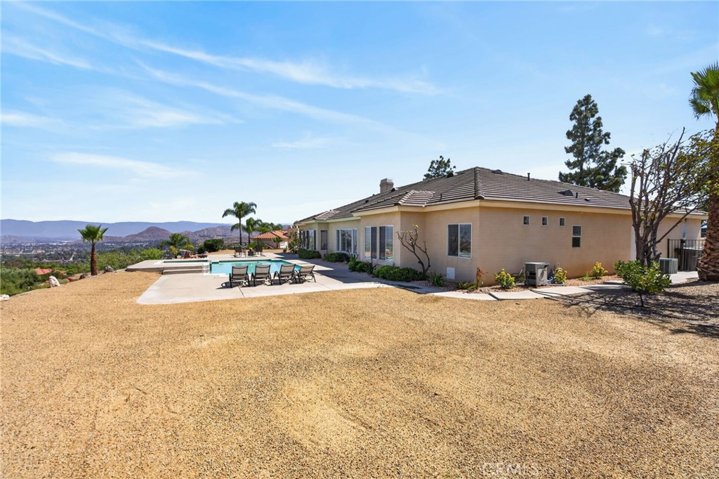 6201 Omega Street Riverside, CA 92506 - Photo 54 of 70 a front view of a house with a yard