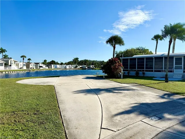 a view of a house with swimming pool and outdoor space