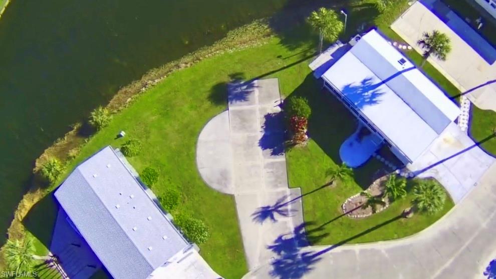 351 Bobcat Run Naples, FL 34114 - Photo 11 of 38 an aerial view of a house