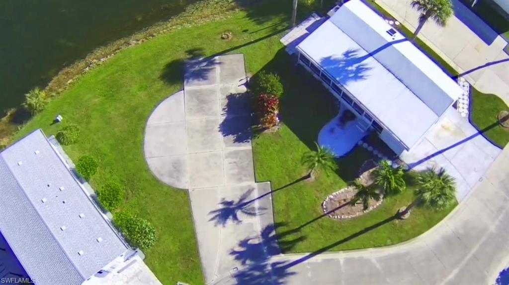 351 Bobcat Run Naples, FL 34114 - Photo 2 of 38 an aerial view of a house