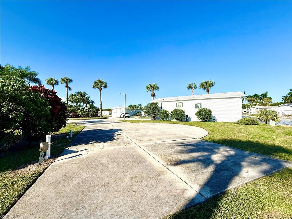 351 Bobcat Run Naples, FL 34114 - Photo 6 of 38 a view of street with houses