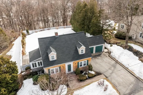 a view of a house with a snow