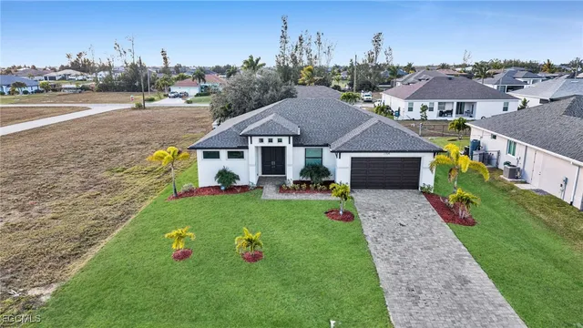 a aerial view of a house with garden
