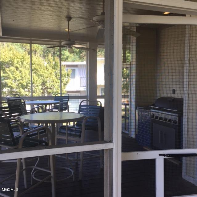 3230 Cumberland Road, Unit 8 Ocean Springs, MS 39564 - Photo 23 of 42 Club House Porch and Grill area