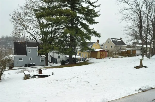 a view of a road with snow on the road