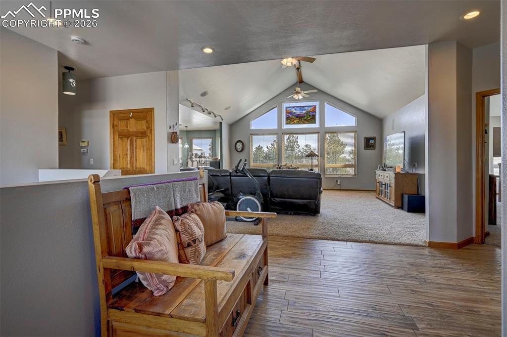 5910 McCart Ranch Circle Elizabeth, CO 80107 - Photo 4 of 50 a living room with furniture or window and a wooden floor