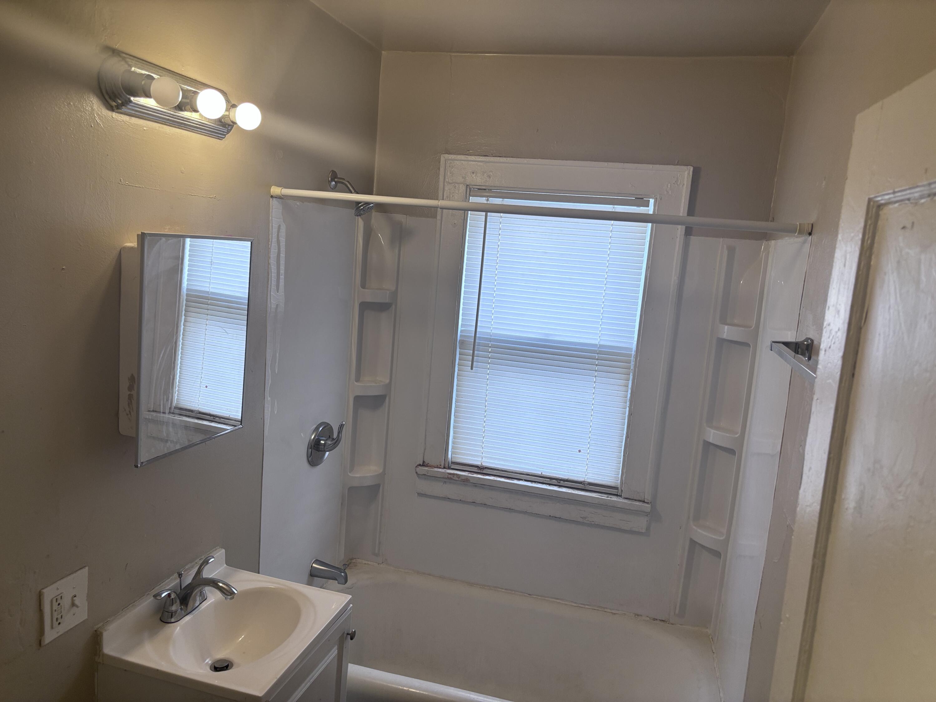 3719 Vel R. Phillips Avenue, Unit 3721 Milwaukee, WI 53212 - Photo 7 of 9 Unit 1 Bathroom