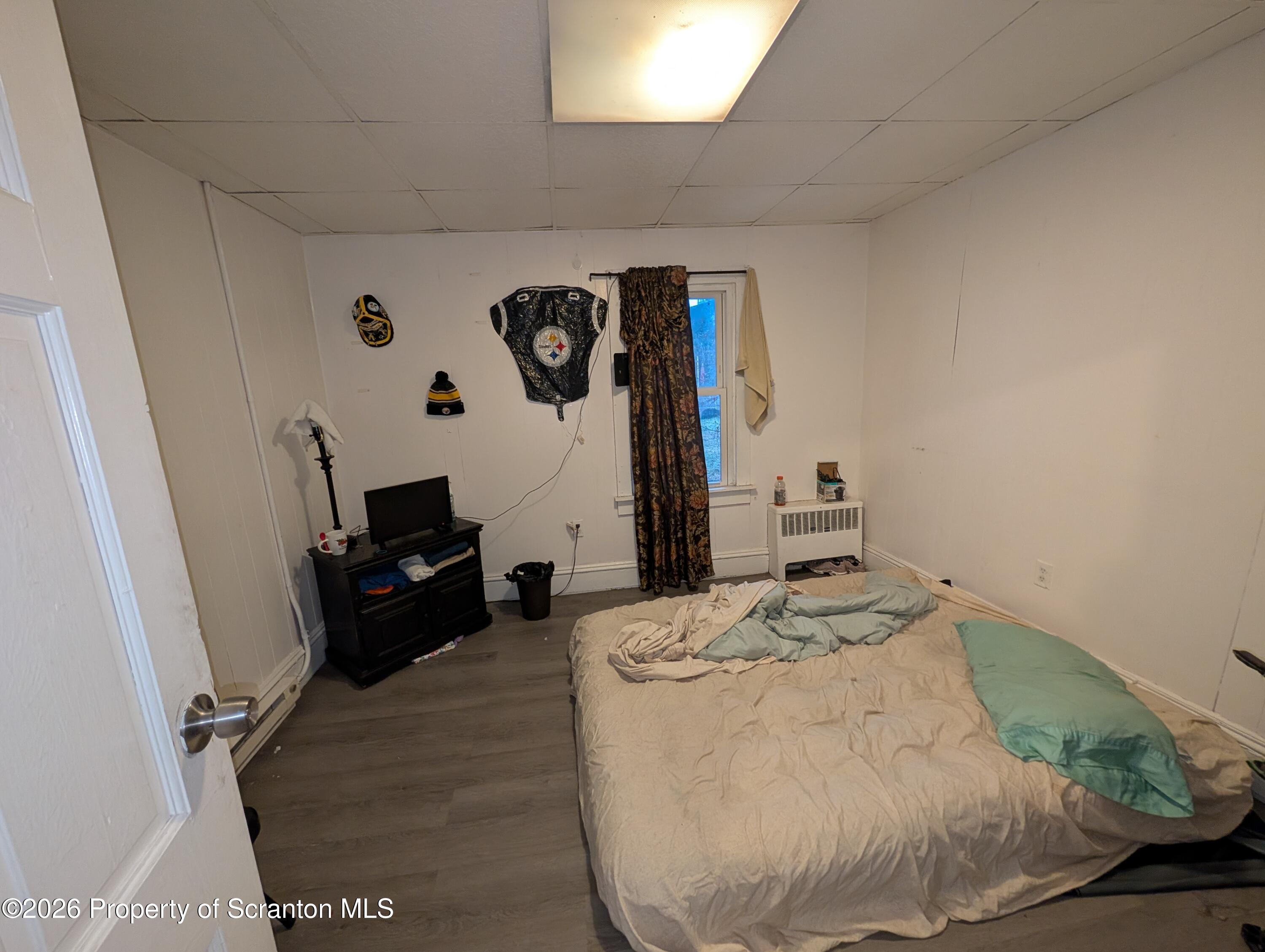 123 South Bromley Avenue Scranton, PA 18504 - Photo 11 of 15 a living room with furniture and a flat screen tv