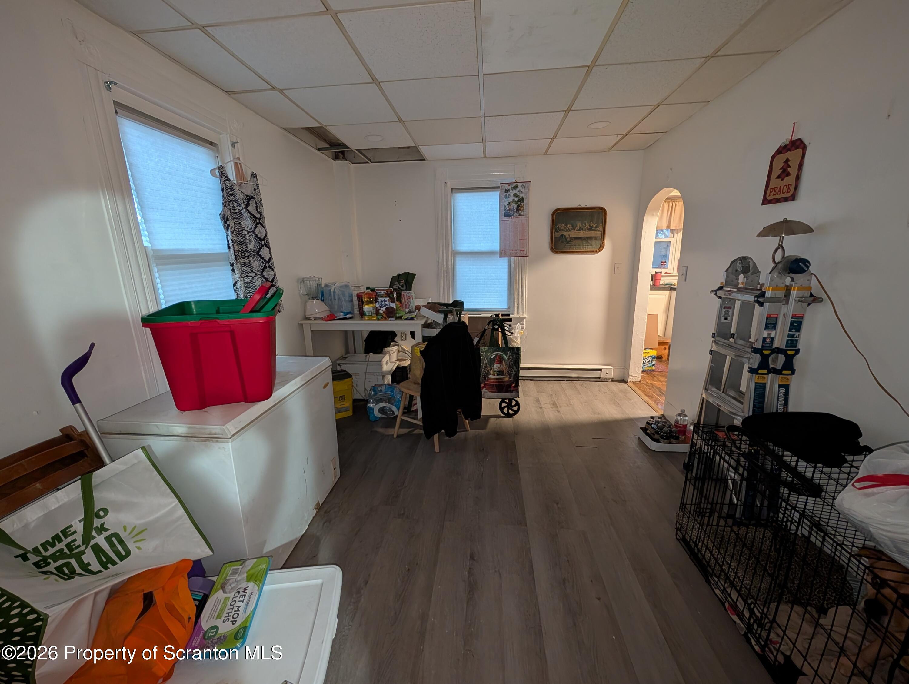 123 South Bromley Avenue Scranton, PA 18504 - Photo 4 of 15 a living room with furniture and a flat screen tv