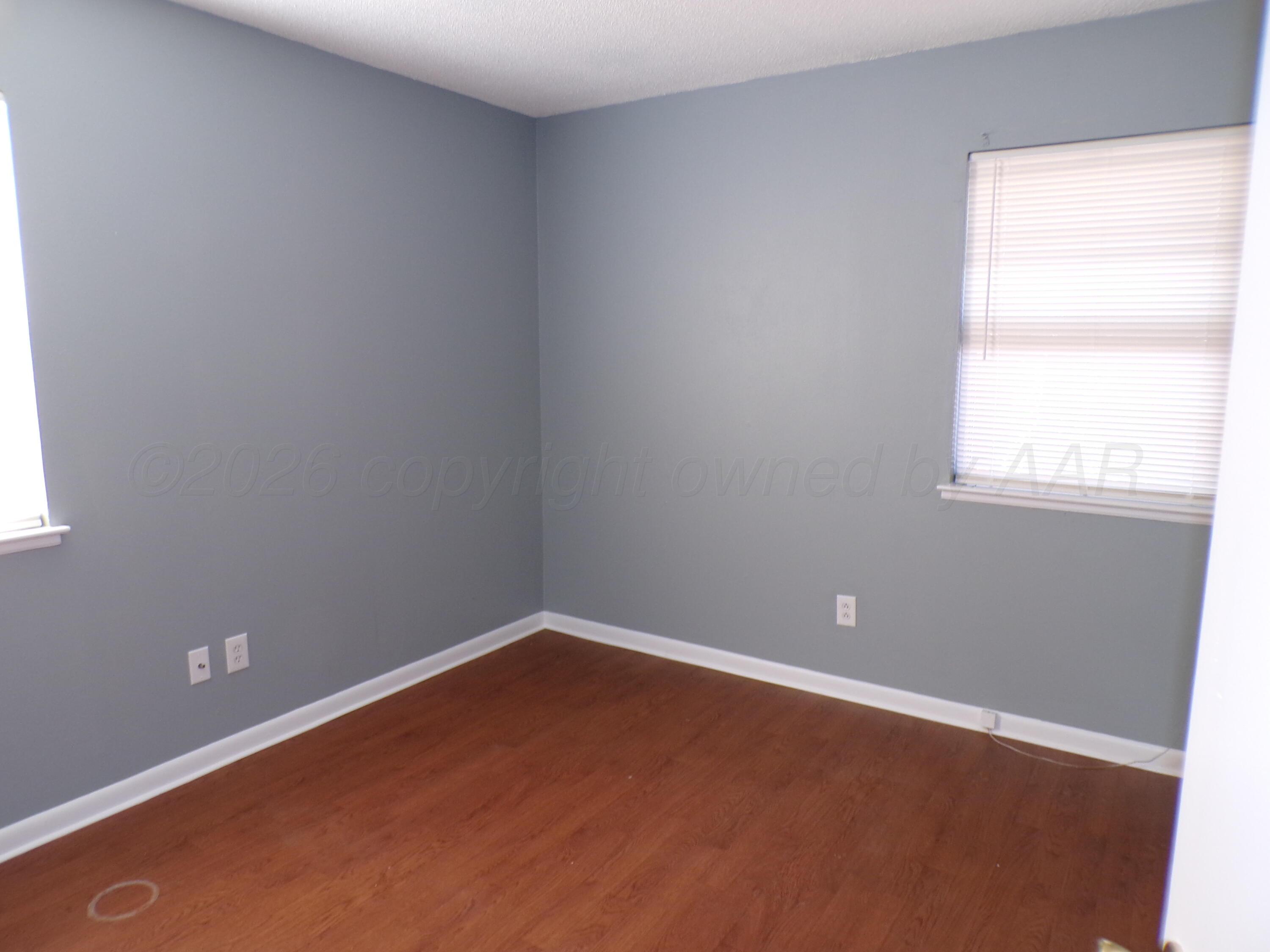 403 North Robey Avenue Fritch, TX 79036 - Photo 19 of 24 an empty room with a window
