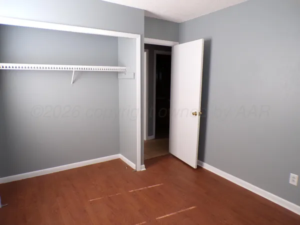 an empty room with closet