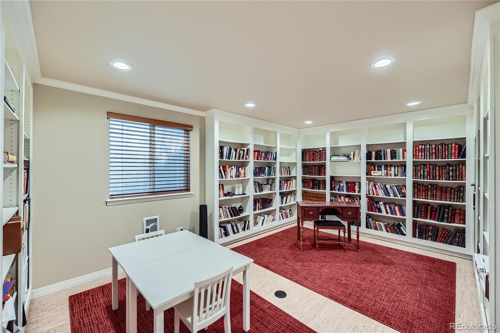 7009 Winter Ridge Place Castle Pines, CO 80108 - Photo 35 of 42 a view of a livingroom with furniture and window