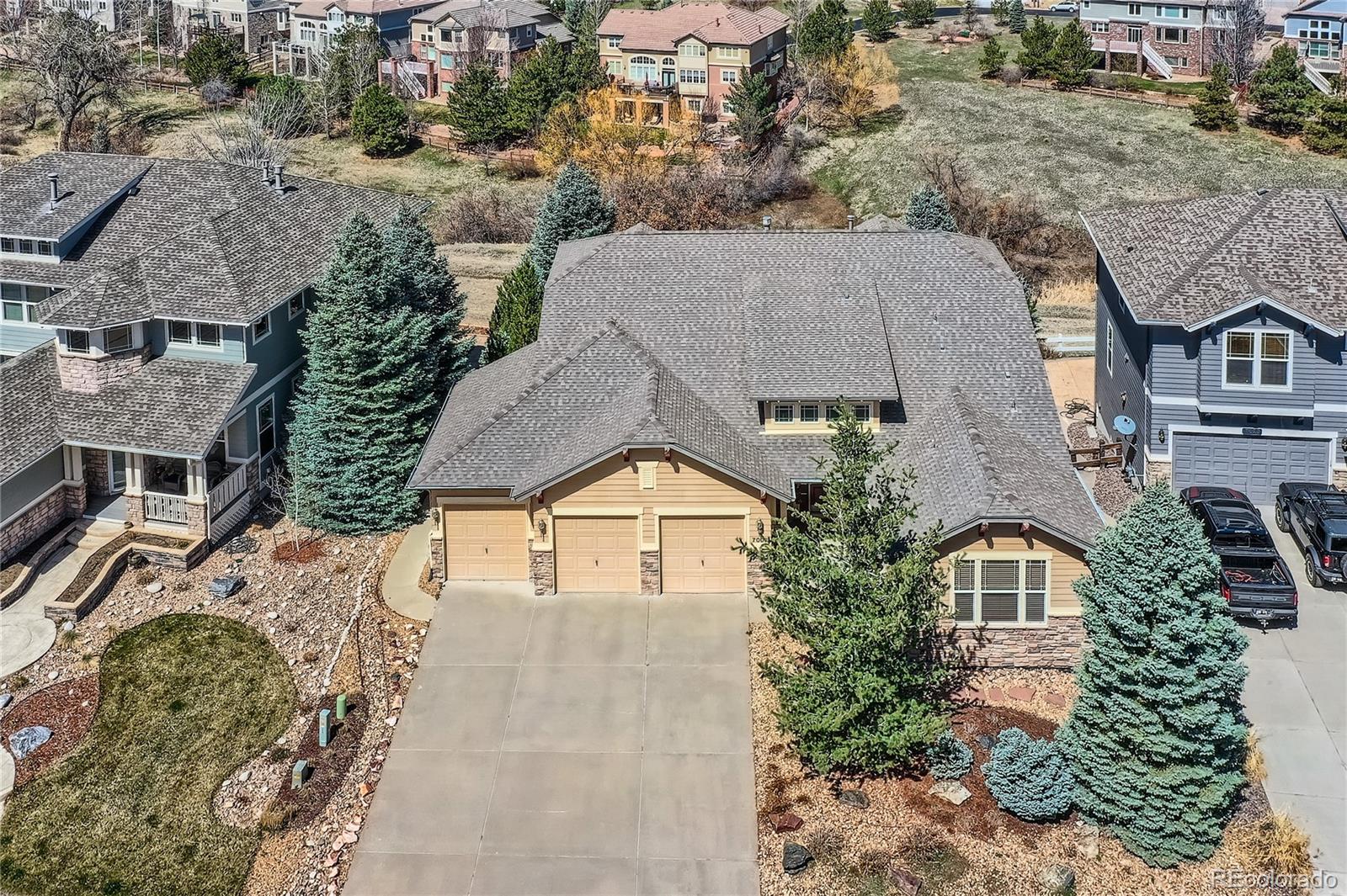 7009 Winter Ridge Place Castle Pines, CO 80108 - Photo 39 of 42 an aerial view of a house