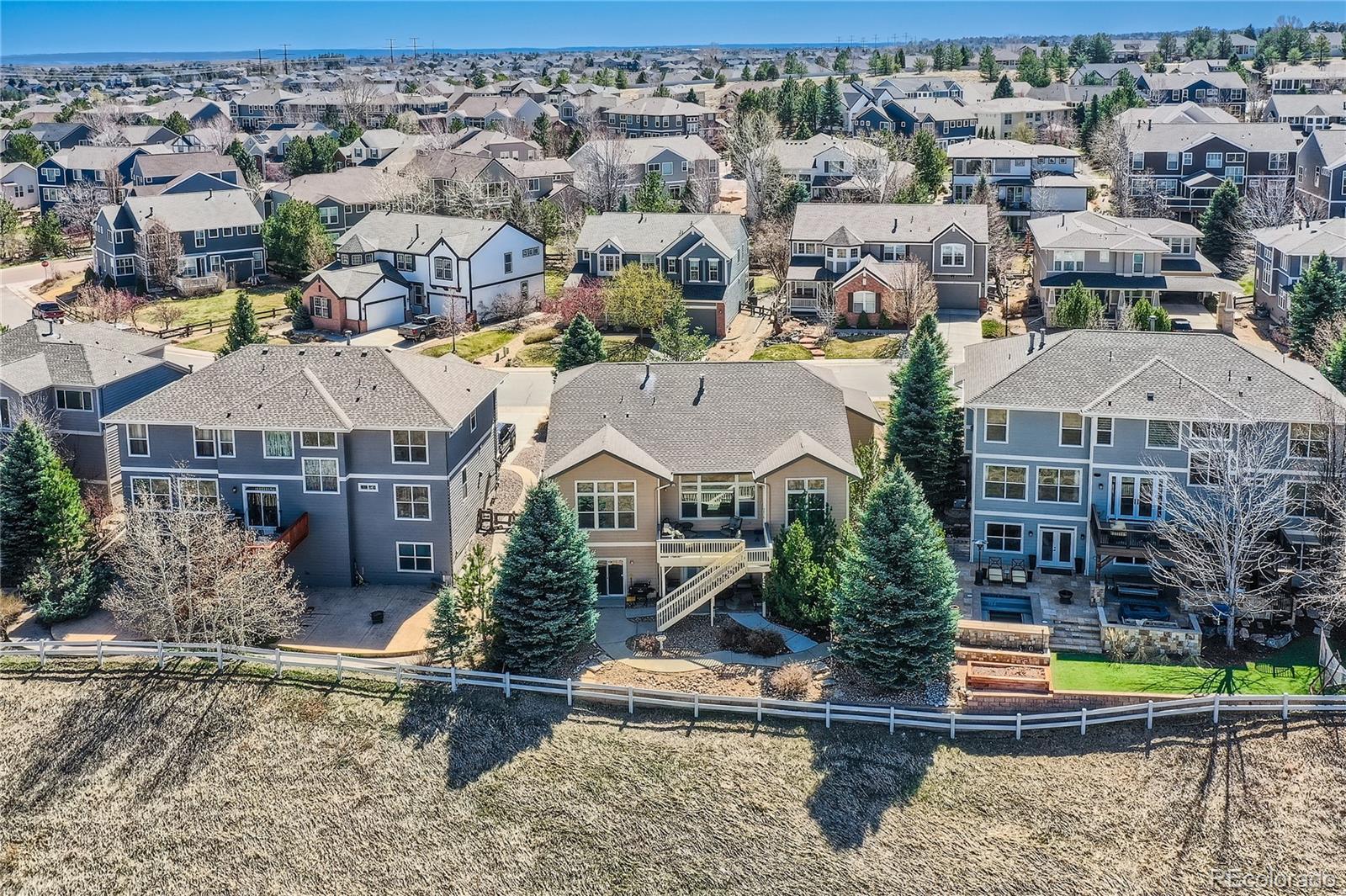 7009 Winter Ridge Place Castle Pines, CO 80108 - Photo 40 of 42 an aerial view of multiple house