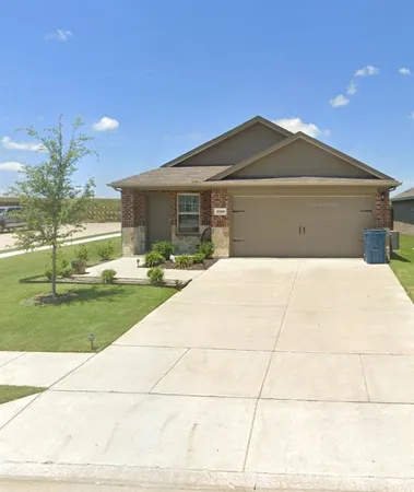 a front view of house with yard