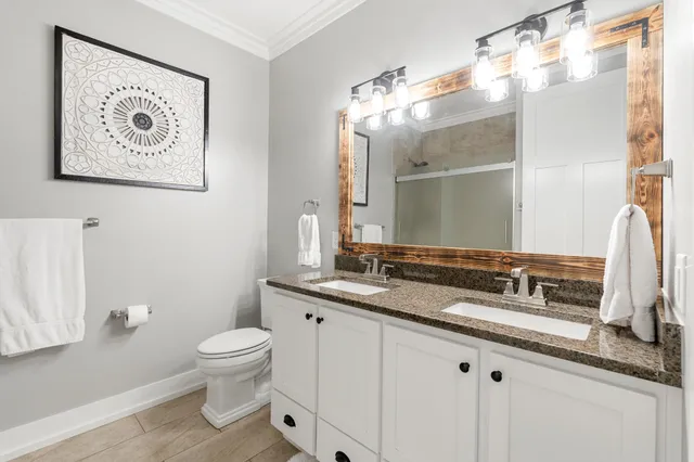 a view of a dining room with furniture and window