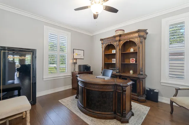 a kitchen with cabinets and a stove