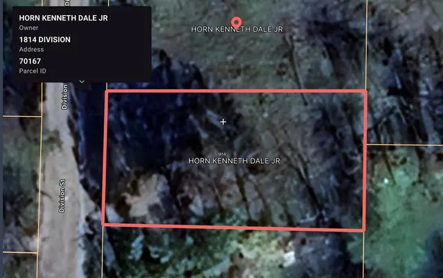 a view of yard covered with snow