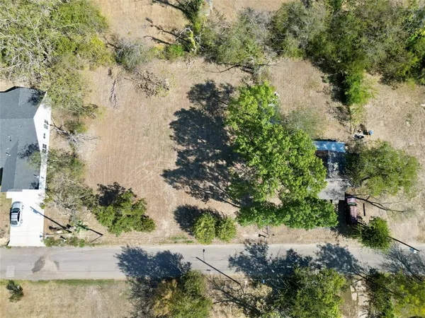 an aerial view of residential house with outdoor space
