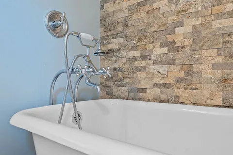 a bathroom with a bathtub